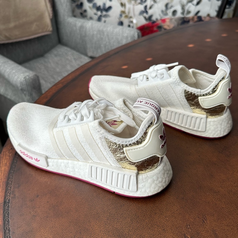 adidas White and Gold NMD R1 Athletic Shoes with Pink Accents